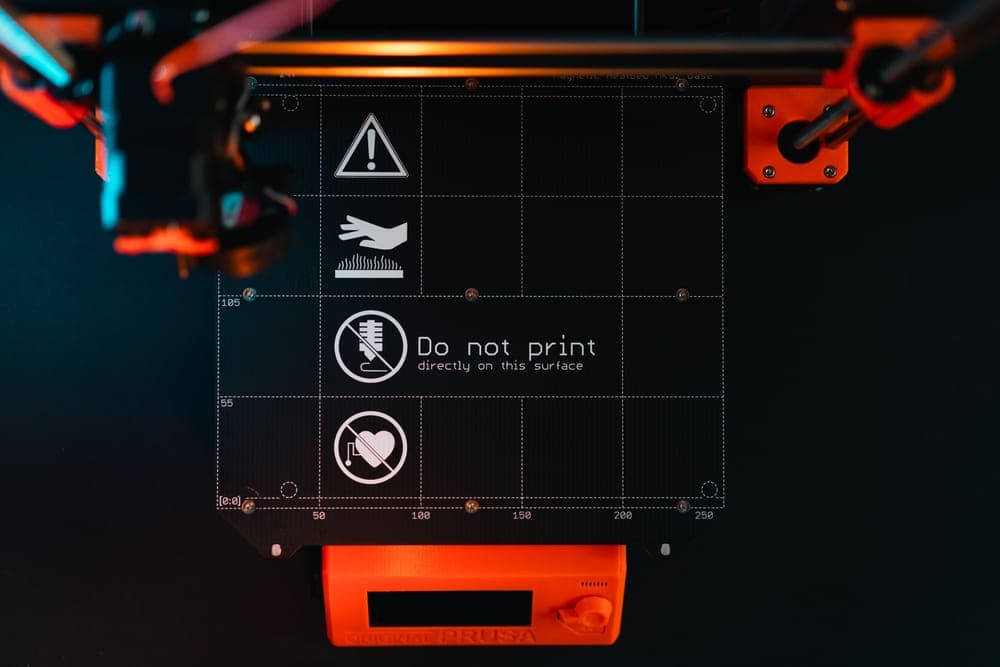 A 3D printer first layer being laid onto a build plate