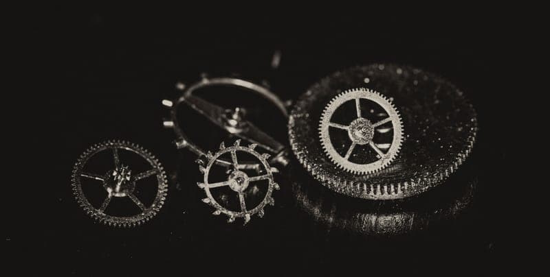Small hardened steel gears photographed close up